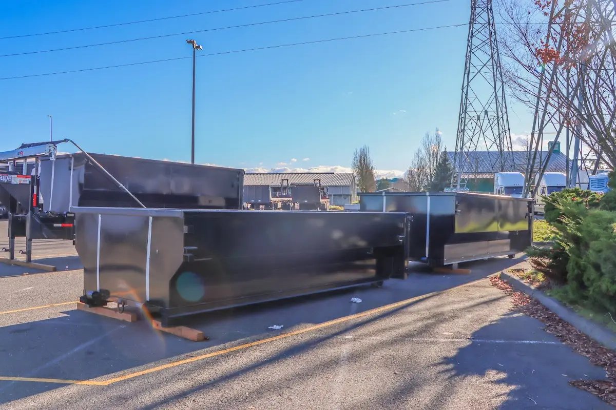 Roll-off dumpster ready for waste disposal at job site for Construction Dumpster Rental in Farr West